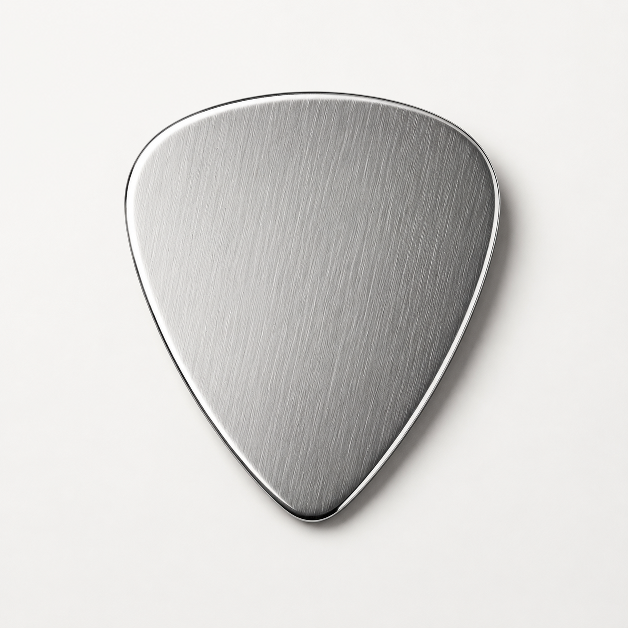 Polished metal guitar pick
